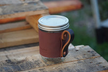 Load image into Gallery viewer, Mason Jars with handmade leather holster for easy and durable drinking. Looking for a wonderful leather gift for you or your family? Buy the Mason jar Snowday leather holster. Snowday Leather | Missoula, MT