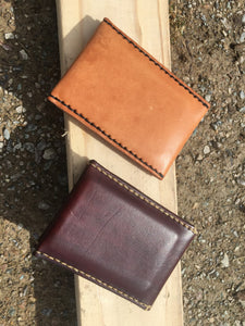 Similar to Bifold Twin but flipped a bit.  Sleeves are in a vertical orientation. You like?  Same bomber stitching and full grain leather. Waxed finish. Veg tan. 3.5" by 4.5". Snowday Leather | Missoula, MT
